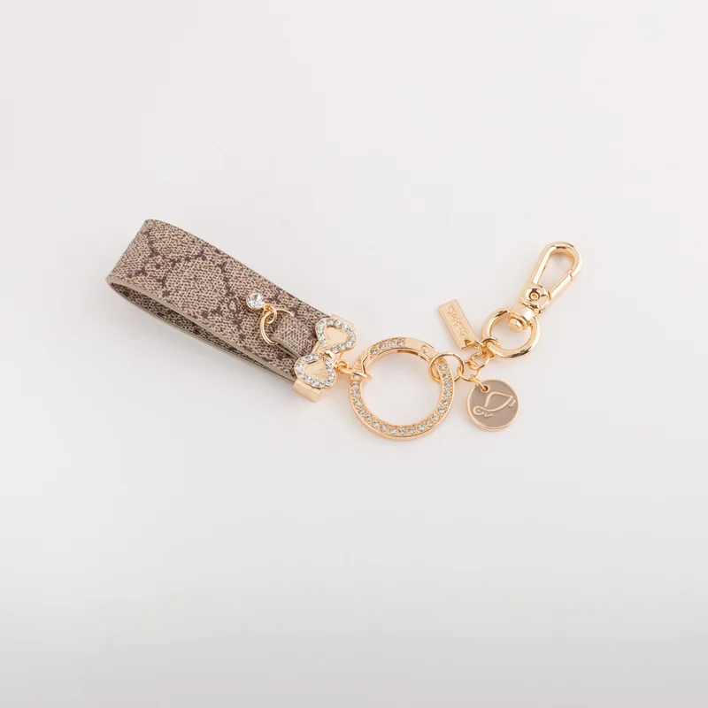 كاربيزا ميدالية مفاتيح فيونكة مرصعة بالكريستال